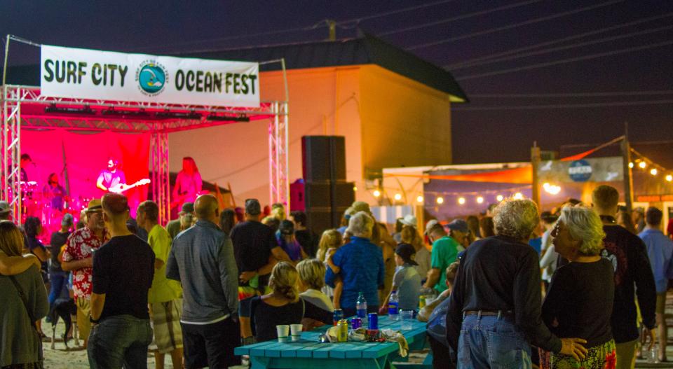 Festival goers gather for one of the six live bands that performed at the 2019 Ocean Fest in Surf City.