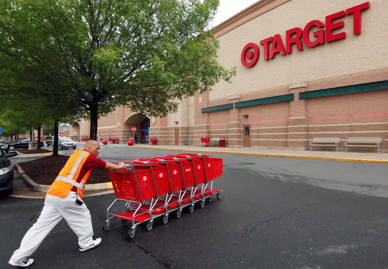 FILE PHOTO: A Target employee returns carts to the store in Falls Church