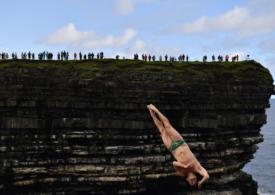 Steven LoBue of USA dives during the 2021 Cliff Diving World Series in Downpatrick Head, Ireland, September 12, 2021. REUTERS/Clodagh Kilcoyne     TPX IMAGES OF THE DAY