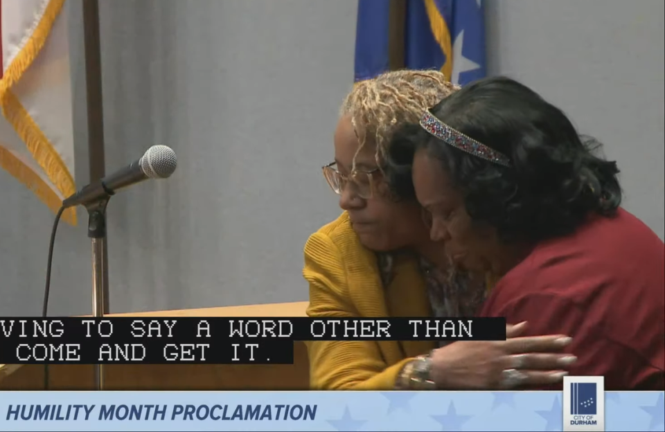 Mayor Elaine O’Neal, left, hugs council member Monique Holsey-Hyman in a Durham City Council meeting on Monday, May 1, 2023.