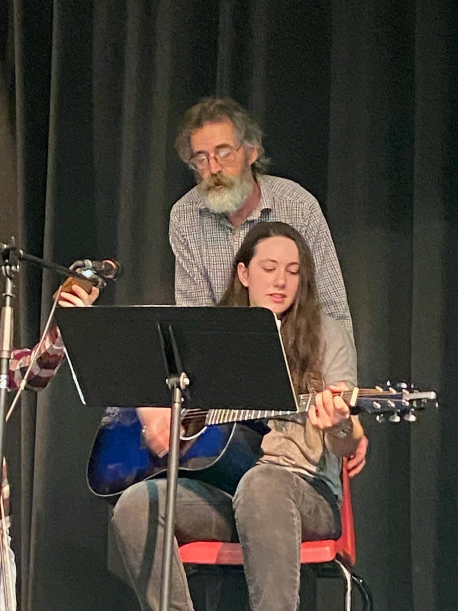 Joe Vanderweerd and his daughter Laura perform Come Walk With Me during a performance in Morell in March 2023. Laura was killed in a car collision the following December.