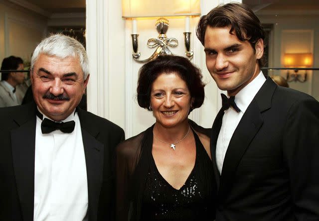 <p>Andrew Parsons - PA Images/PA Images/Getty</p> Roger Federer with his father Robert and mother Lynette.