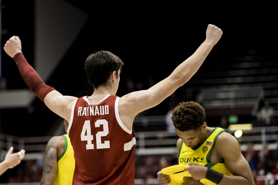 Stanford forward Maxime Raynaud (42) celebrates the team's 71-64 win over Oregon in an NCAA college basketball game in Stanford, Calif., Saturday, Jan. 21, 2023. (AP Photo/John Hefti)