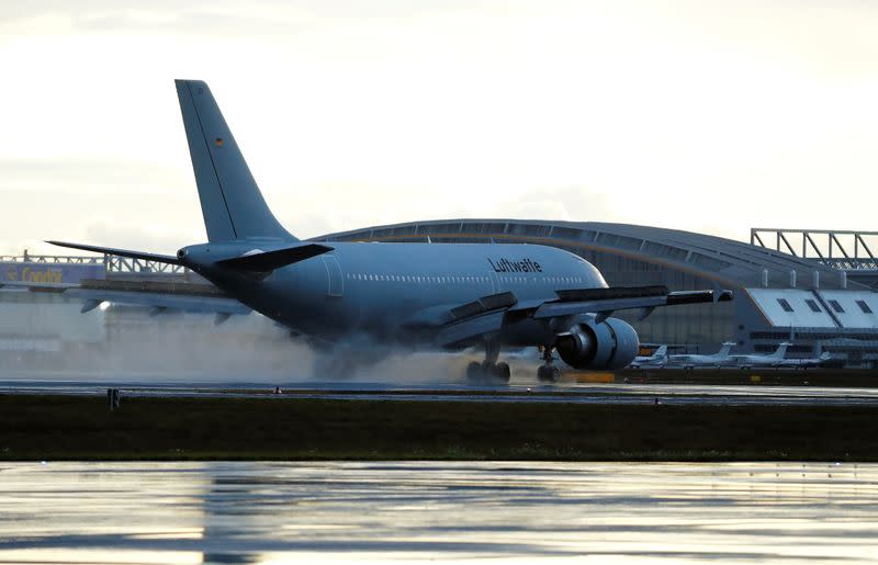 German Air Force plane, carrying evacuated citizens, returns from China's Wuhan to Frankfurt