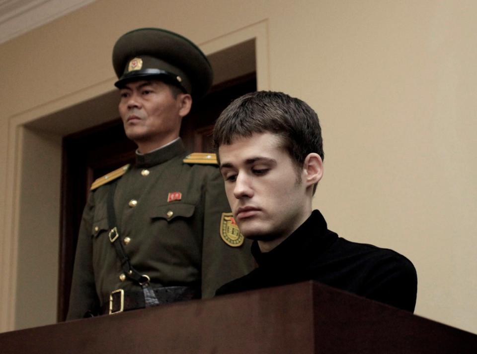 Matthew Miller, a US citizen, sits on the dock at the Supreme Court during his trial in Pyongyang in September 2014 (AP)