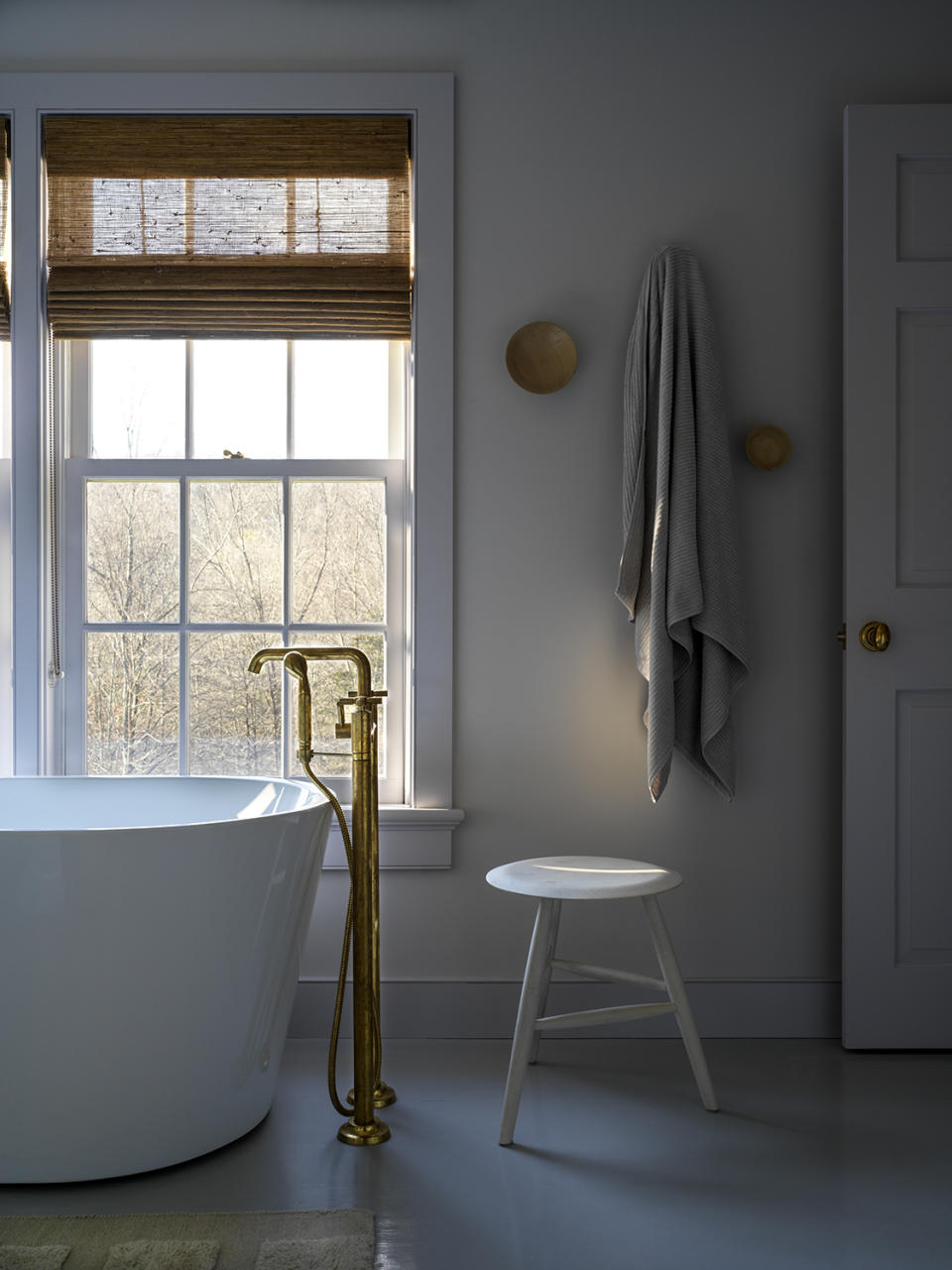 Neutral bathroom with bamboo blinds