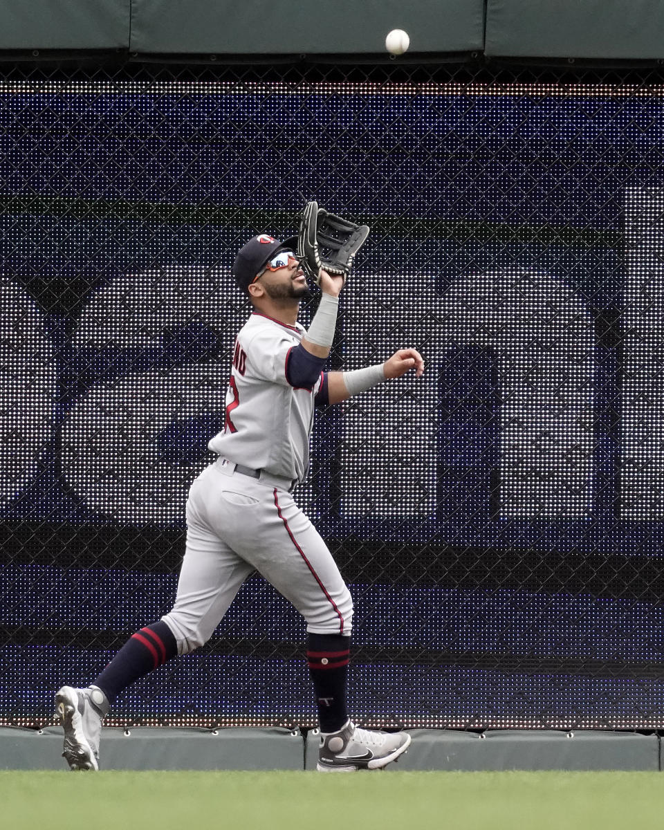 Minnesota Twins center fielder Gilberto Celestino catches a fly ball for the out on Kansas City Royals' MJ Melendez during the first inning of a baseball game Thursday, Sept. 22, 2022, in Kansas City, Mo. (AP Photo/Charlie Riedel)