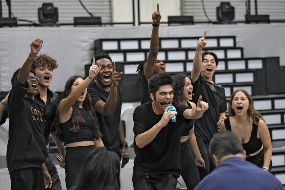 Cast members preform during a rehearsal for the touring show "Hits! The Musical" Wednesday, Feb. 8, 2023, in Clearwater, Fla. Singer Dionne Warwick and her son Damon Elliott are co-producing the 50-city touring show. (AP Photo/Chris O'Meara)