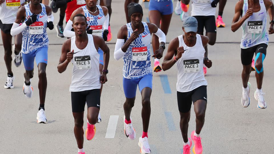 Kiptum sets off behind two pacesetters at the Chicago Marathon last month. - Michael Reaves/Getty Images