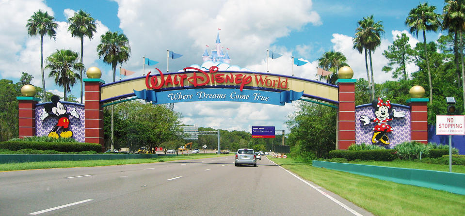 Lake Buena Vista, Florida, USA - August 19, 2015: an entrance of Walt Disney World Resort. Some cars are visible.