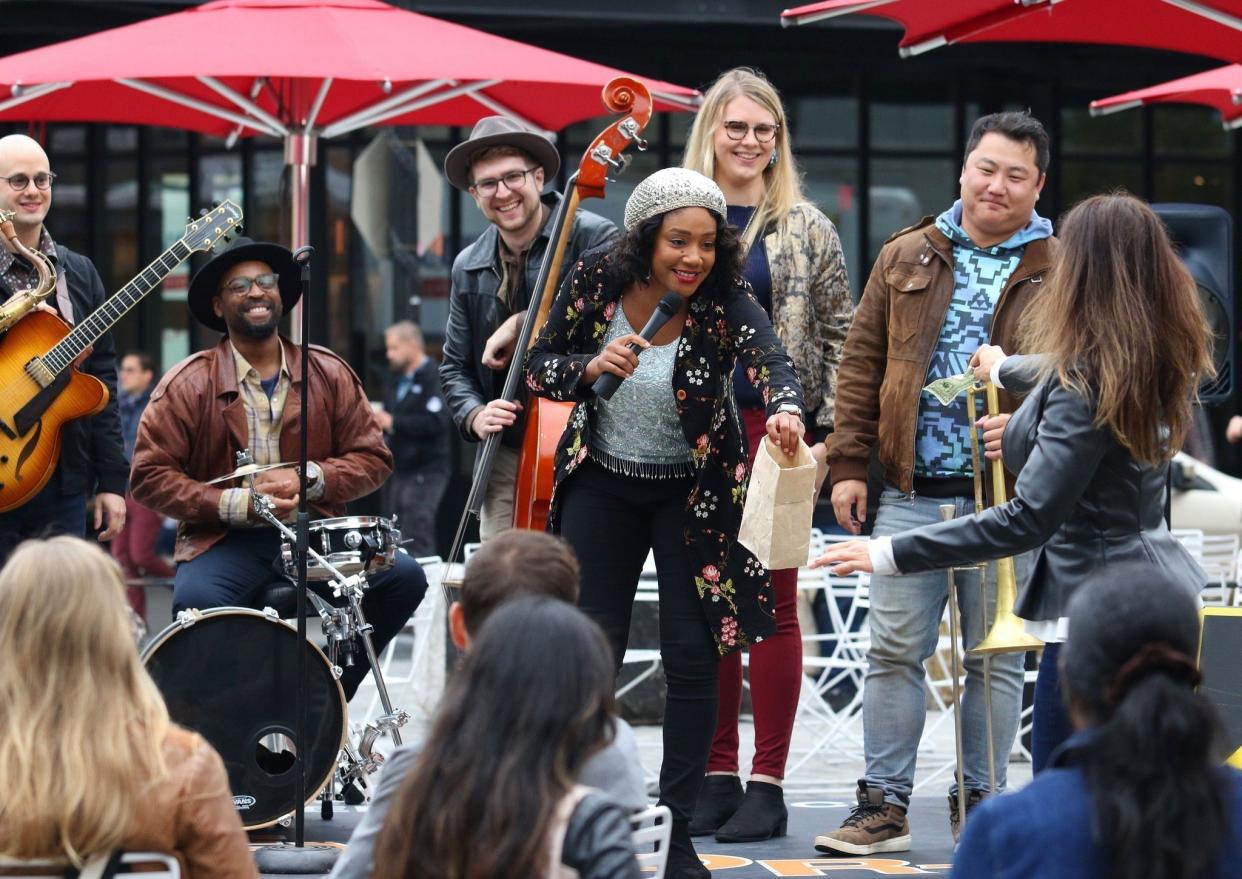 Tiffany Haddish is seen performing as a street singer for a scene for the upcoming comedy movie "Here Today" in Manhattan's Meatpacking District on Tuesday, Oct. 22, 2019. Billy was seen directing Tiffany as her character hustles for money during a live music street performance.