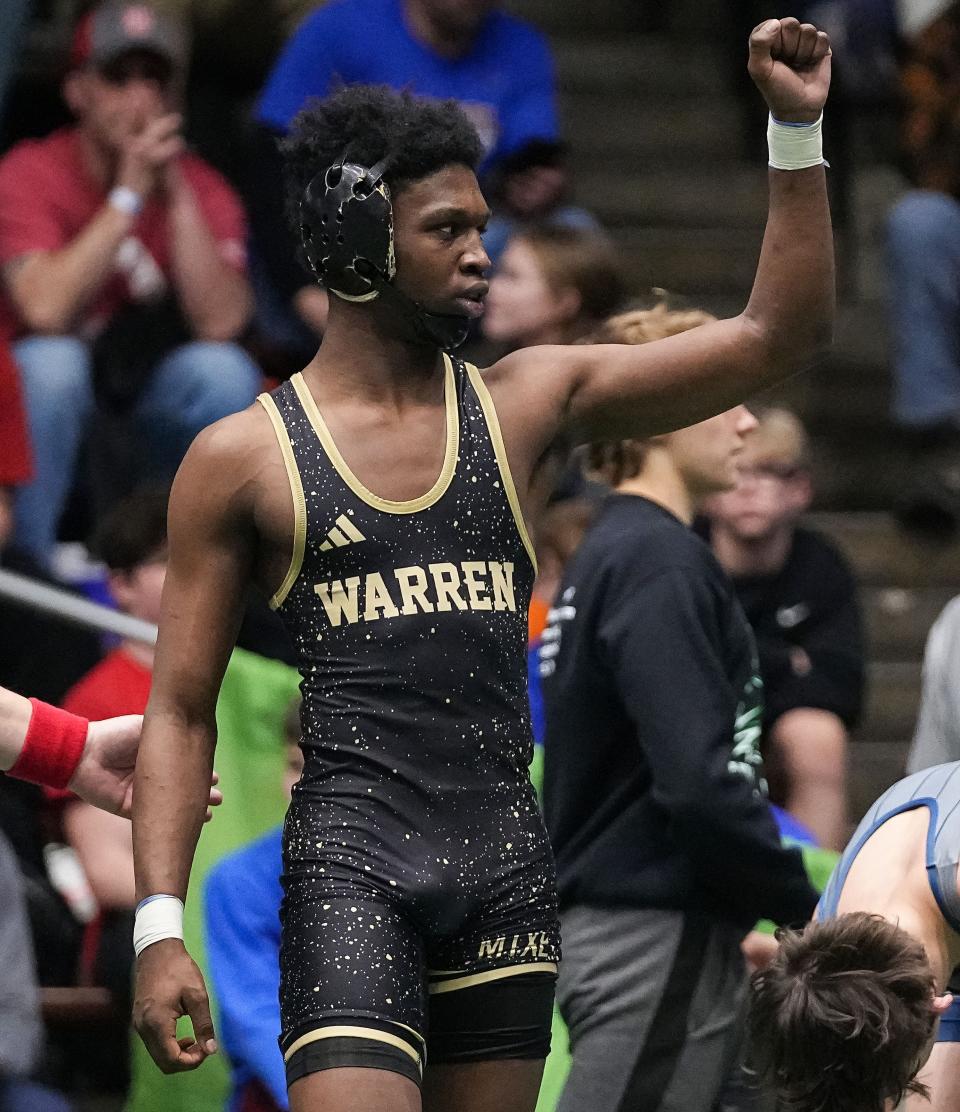 Warren Central Kyrel Leavell celebrates defeating Perry Meridian Keaton Morton during the IHSAA wrestling semi-state on Saturday, Feb. 11, 2023 at New Castle Fieldhouse in New Castle.