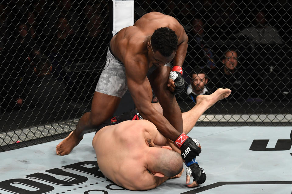 Francis Ngannou lands the finishing blows against Cain Velasquez on Sunday in Phoenix. (Getty Images)