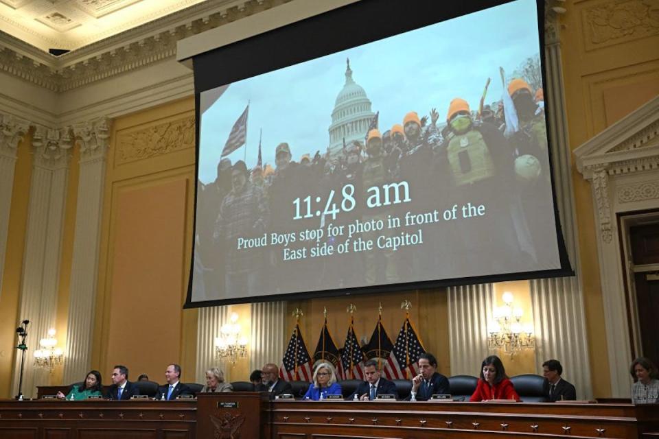 A video shown during a House Select Committee hearing to investigate the January 6, 2021, attack on the U.S. Capitol. <a href="https://www.gettyimages.com/detail/news-photo/video-showing-proud-boys-members-appear-on-screen-during-a-news-photo/1241209865?phrase=proud%20boys&adppopup=true" rel="nofollow noopener" target="_blank" data-ylk="slk:Mandel Ngan/AFP via Getty Images;elm:context_link;itc:0;sec:content-canvas" class="link ">Mandel Ngan/AFP via Getty Images</a>