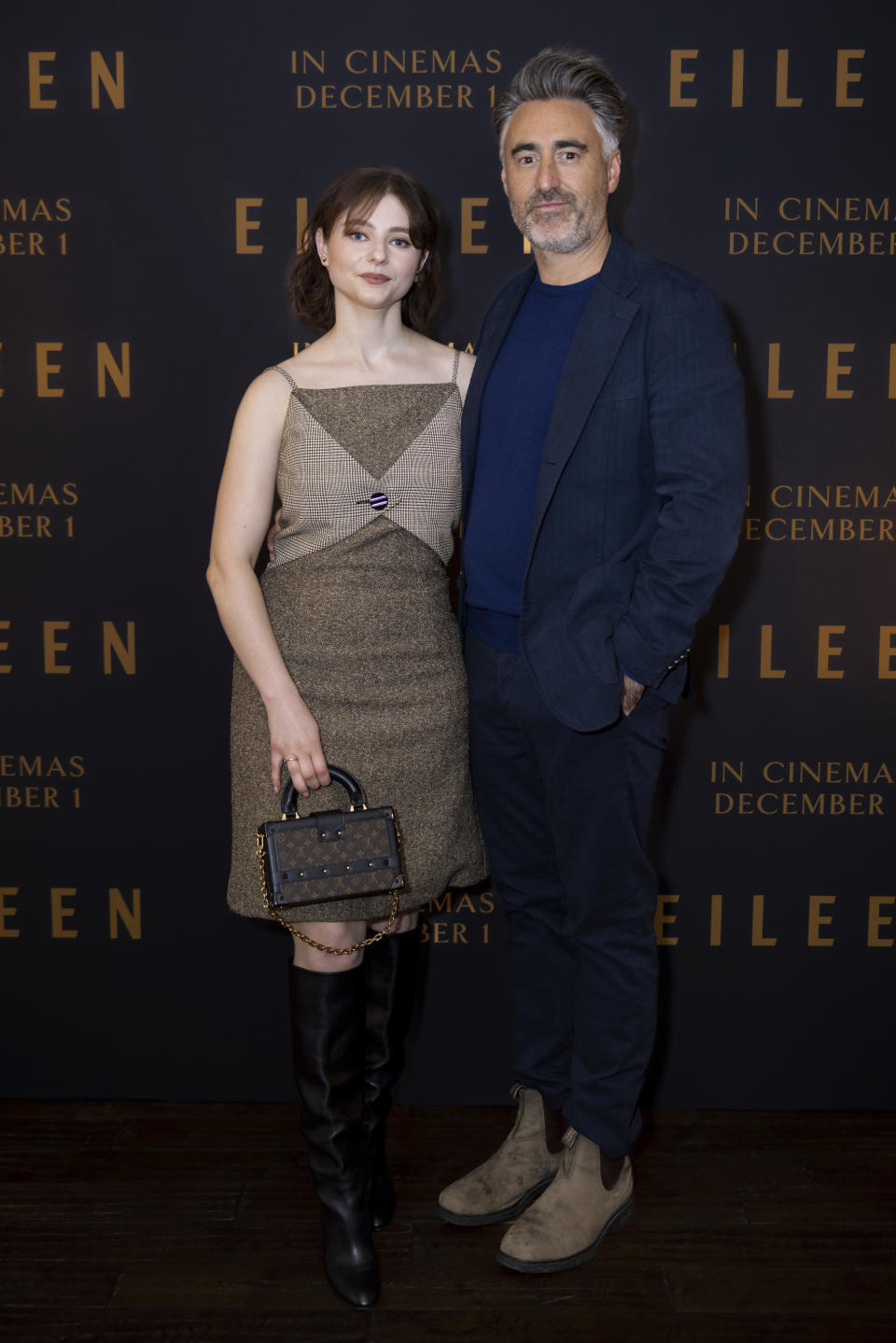 Thomasin McKenzie, left, and William Oldroyd pose for photographers upon arrival at the screening of the film 'Eileen' in London Monday, Nov. 13, 2021. (Photo by Vianney Le Caer/Invision/AP)