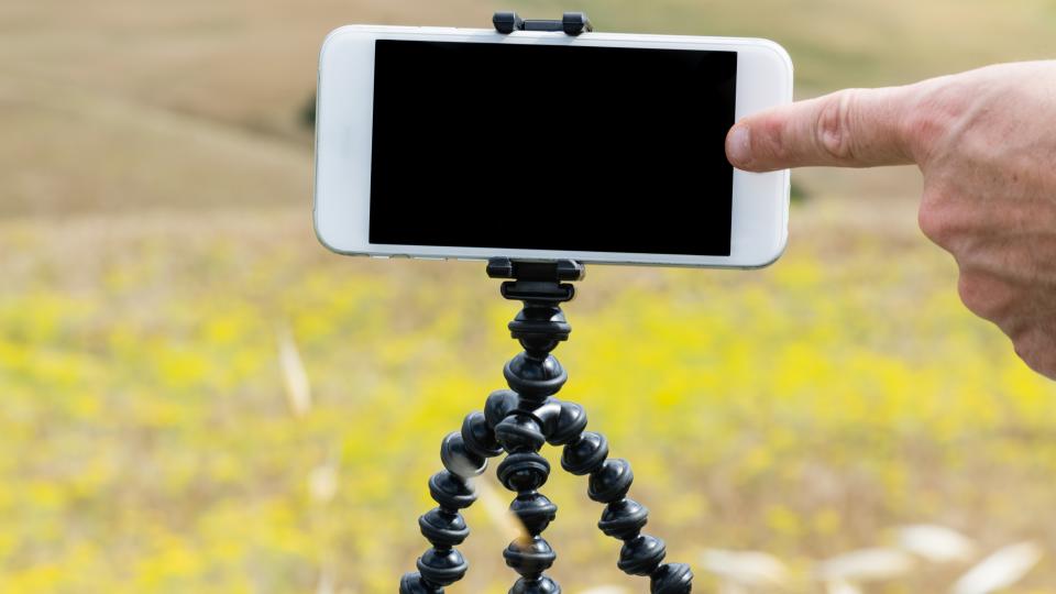 Smartphone on its magnetic tripod