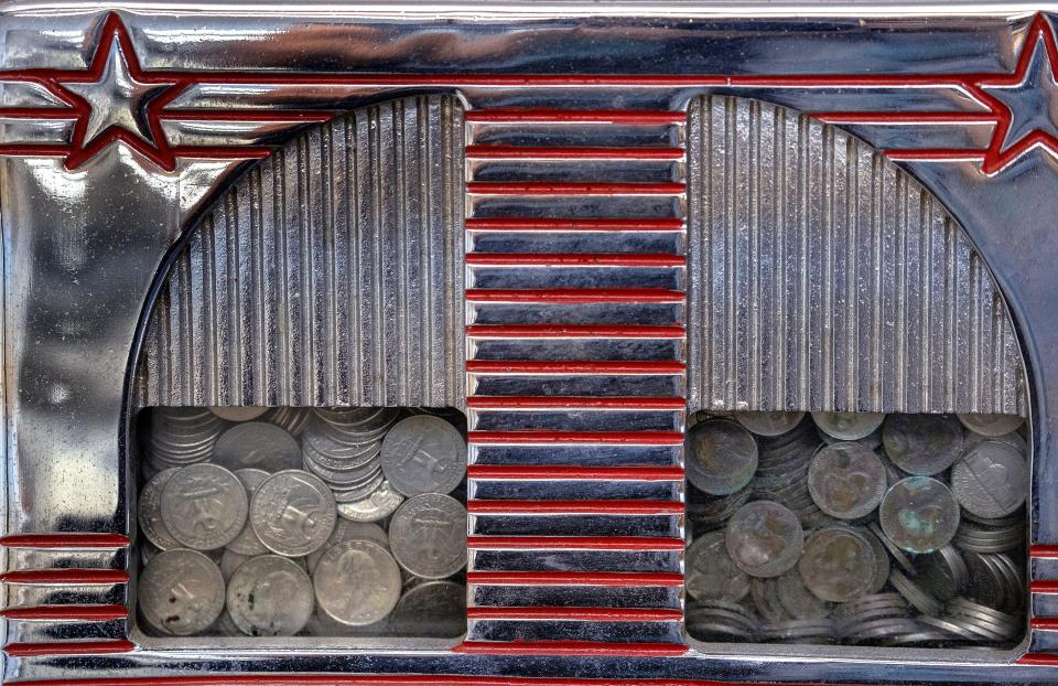 Coins still are sitting in a game, seen in Bob Peltz's Big Boy Toys Restorations shop Monday, June 6, 2022 in Lebanon. Peltz fixes and restores pre-1975 vintage items like classic jukeboxes, Coke machines, pinball machines, etc.