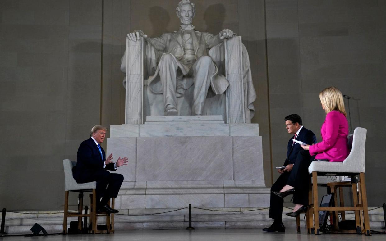 President Trump with Fox News anchors Bret Baier and Martha MacCallum, both of whom are quarantining - Evan Vucci /AP