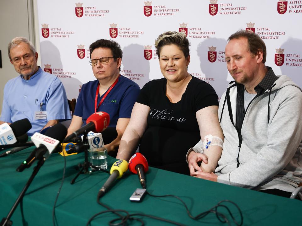 Dominika Clarke and Vince Clarke, the parents of the quintuplets are seen with doctors during a press conference at the University Hospital.