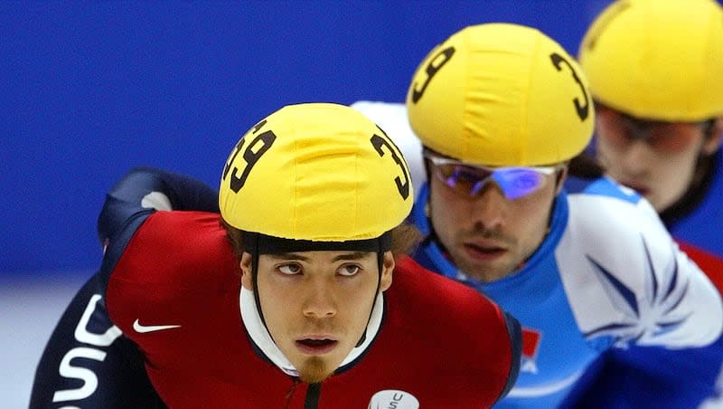 Apolo Ohno races during a 1500m Short Track heat Wednesday, Feb. 20, 2002 at the Salt Lake Ice Center. Ohno, the most decorated U.S. winter Olympian, won eight medals in short track speed skating in three successive games, starting with the 2002 Winter Games in Salt Lake City.