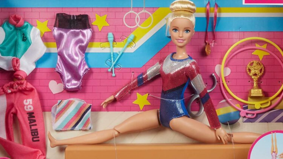 A gymnastics Barbie doll.