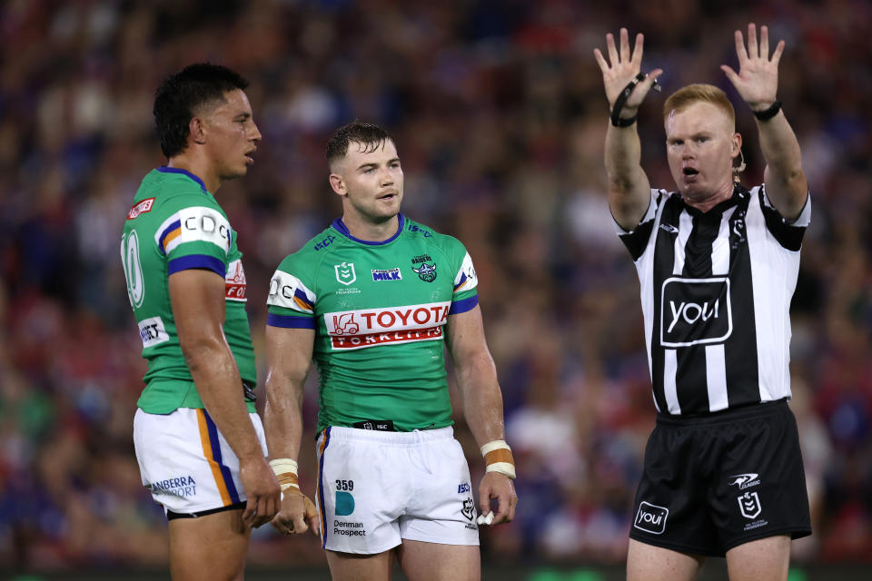 NEWCASTLE, AUSTRALIA - MARCH 07:  Hudson Young of the Raiders is sent to the sin-bin by referee Todd Smith during the round one NRL match between Newcastle Knights and Canberra Raiders at McDonald Jones Stadium on March 07, 2024, in Newcastle, Australia. (Photo by Brendon Thorne/Getty Images)