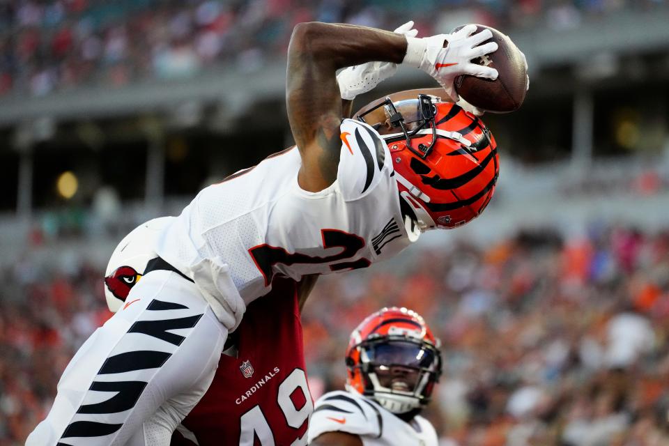 Aug 12, 2022; Cincinnati, Ohio, USA;  Cincinnati Bengals safety Dax Hill (23) breaks up and nearly intercepts a pass intended for Arizona Cardinals tight end Chris Pierce Jr. (49) in the end zone during the first quarter of the NFL Preseason Week One game between the Cincinnati Bengals and Arizona Cardinals at Paycor Stadium. Mandatory Credit: Sam Greene-USA TODAY Sports