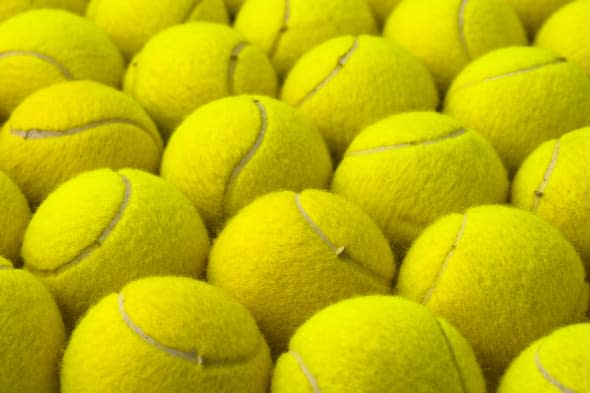 Yellow pattern, made with tennis balls, placed in rows