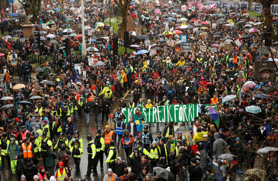 Demonstrators attend a youth climate protest with Swedish environmental activist Greta Thunberg in Bristol, Britain, February 28, 2020. REUTERS/Peter Nicholls