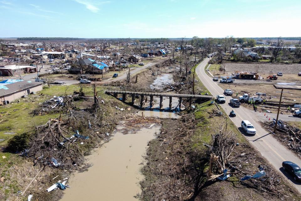 Aerial view of a destroyed neighborhood in Rolling Fork, Mississippi, after a tornado touched down in the area March 27, 2023. - Storm-ravaged Mississippi on March 26, 2023 struggled with the aftermath of a huge tornado that tore across the southern US state and killed at least 25 people, with devastated communities bracing for a fresh bout of extreme weather. Mississippi started clean-up operations after a destructive tornado tore across the state, shredding houses and largely wiping out the small town of Rolling Fork.