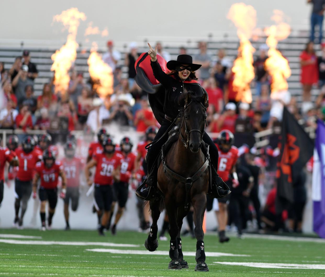 The Masked Rider rides Centennial Champion before the game against Murray State in their season opener, Saturday, Sept. 3, 2022, at Jones AT&T Stadium.  