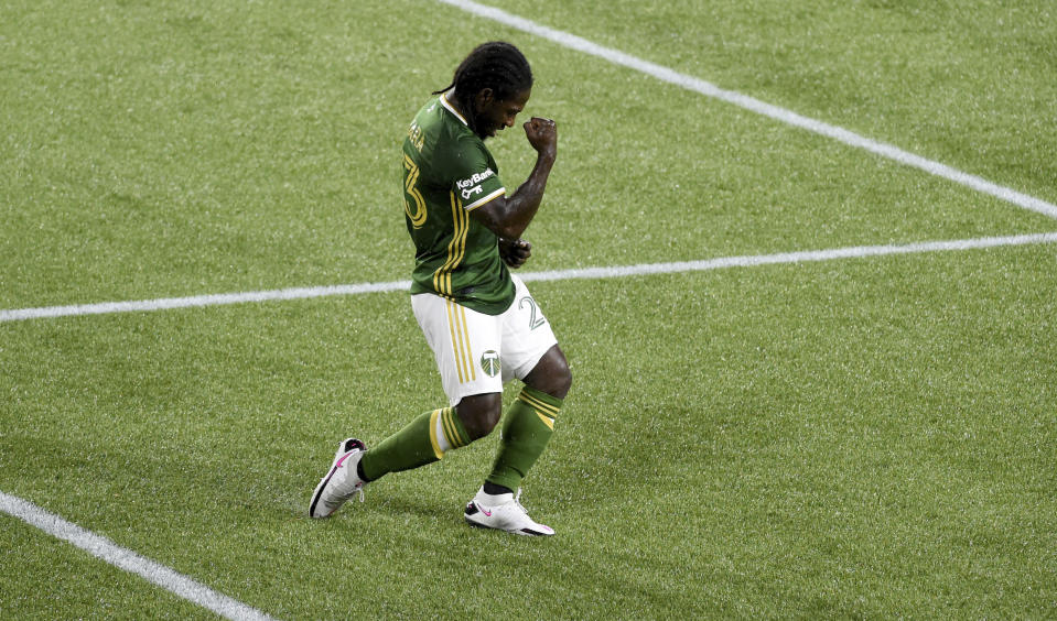 Portland Timbers forward Yimmi Chara celebrates after scoring a goal during the first half of the team's MLS soccer match against the Seattle Sounders in Portland, Ore., Wednesday, Sept. 23, 2020. (AP Photo/Steve Dykes)