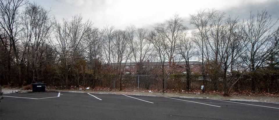 View of the wooded area from the rear parking lot of the Club House Diner on Street Road in Bensalem, where Merrybeth Hodgkinson's remains were found nearly 30 years ago.