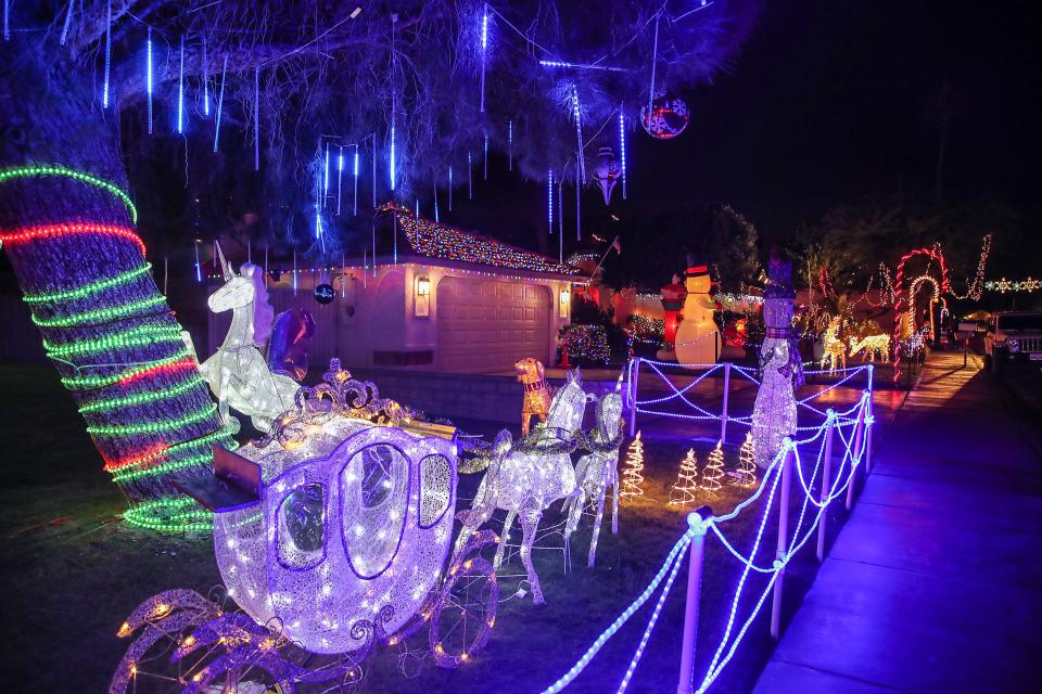 One of the many decorated homes on Minerva Road also known as Candy Cane Lane in Cathedral City, December 15, 2021.