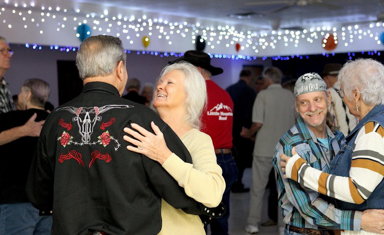 From left to right: Ray Strunk, Rita Strunk, Rodney Reed, and Linda Reed dance to the music of the Little Mountain Band during the weekly senior's dance at the Mitchell Senior Center Saturday evening. The Center, located at 101 Tom Green Drive in Mitchell, hosts dances and other activities for seniors every week. The band Country Plus plays Feb. 3 and 4, Paul Smith plays Feb. 11 and 12 (along with a pitch in dinner), Gary Terrel will play Feb. 17 and 18, with the Little Mountain Band returning Feb. 24 and 25. Admission for members is $6, non-members $7. The doors open at 5 p.m., and the dance starts at 6. There is also bingo every Thursday from 1-3 p.m., and euchre from 3-5 p.m. For more information, call Mitchell Senior Citizens Inc. at 812 849-2024.