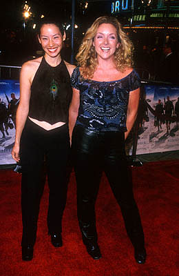 Lucy Liu and Jane Krakowski at the Mann Village Theater premiere of Warner Brothers' Three Kings