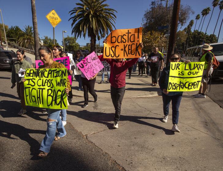 LOS ANGELES, CA-NOVEMBER 1, 2023:Residents and supporters march on Mission Rd. In Lincoln Heights towards the University of Southern California's Health Science Campus on the Eastside to protest against the proposed Discovery Translational Hub development. The project is expected to bring an unprecedented economic upheaval and displacement to East L.A., Boyle Heights, and the communities of Northeast L.A. (Mel Melcon / Los Angeles Times)(Mel Melcon / Los Angeles Times)