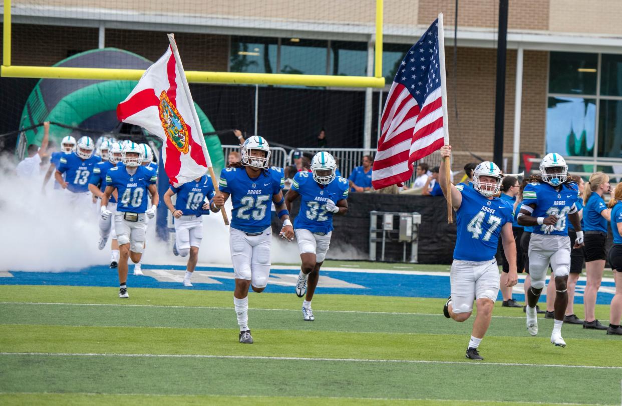 The West Florida football team take the field during the inaugural football season at Pen Air Field the the University of West Florida, Saturday, September 3, 2022.