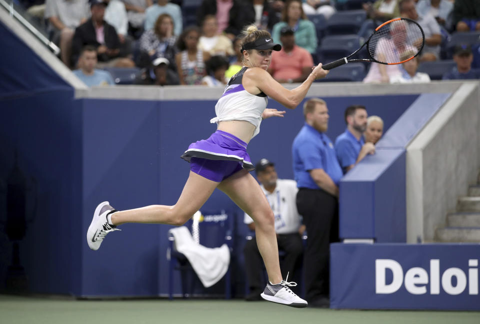 Elina Svitolina, of Ukraine, returns a shot to Venus Williams, of the United States, during the second round of the US Open tennis championships Wednesday, Aug. 28, 2019, in New York. (AP Photo/Michael Owens)