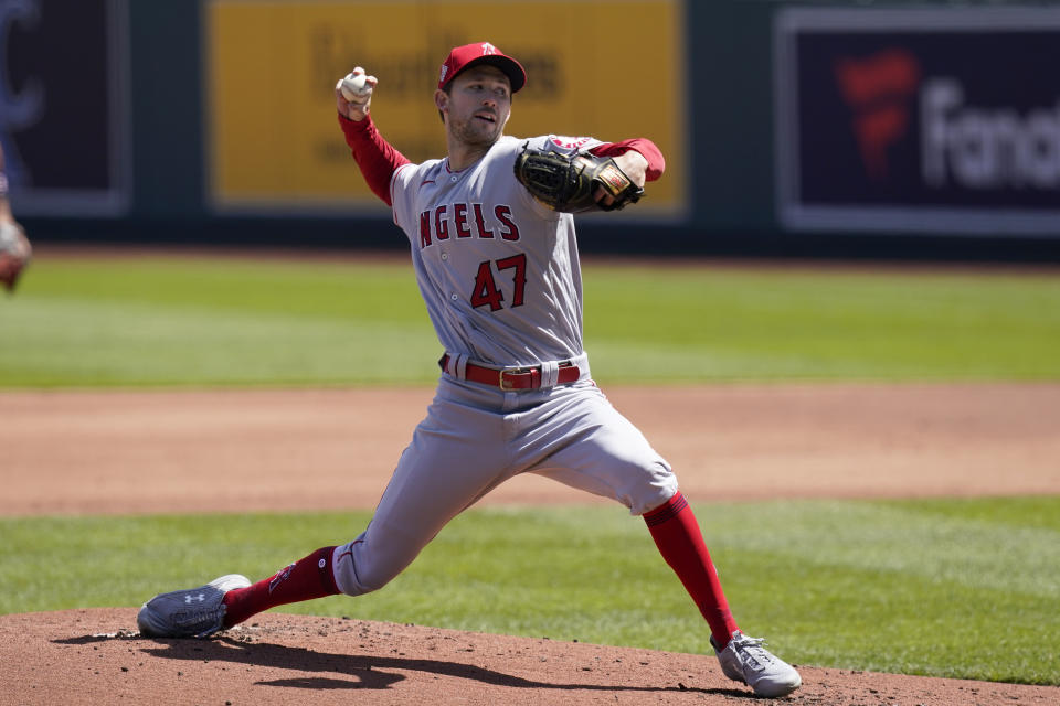 Los Angeles Angels starting pitcher Griffin Canning delivers to a Kansas City Royals batter during the first inning of a baseball game at Kauffman Stadium in Kansas City, Mo., Wednesday, April 14, 2021. (AP Photo/Orlin Wagner)