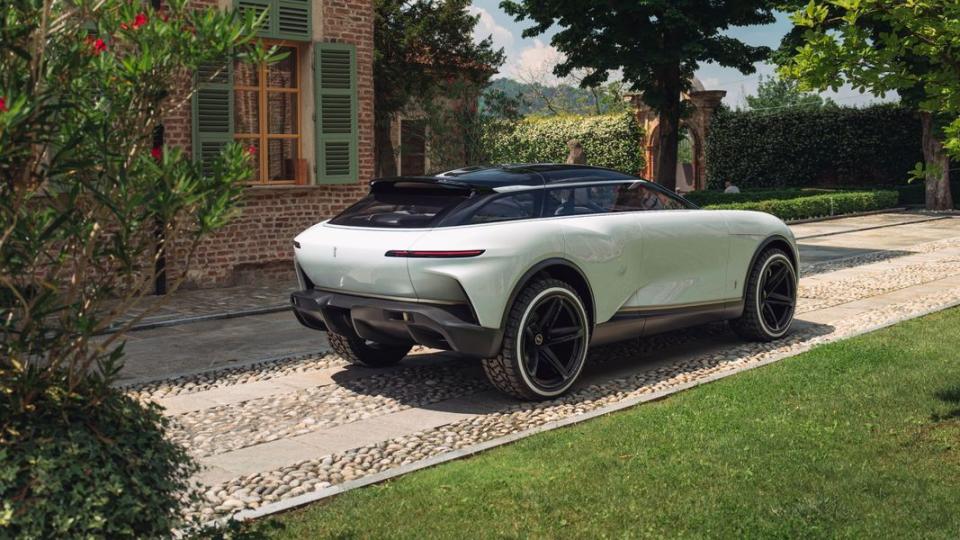 a white car parked on a driveway