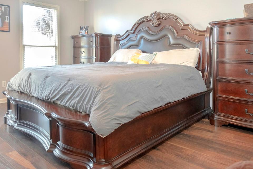 The master bedroom is large enough to accommodate a suite of furniture.