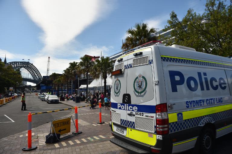 A police van is parked at the Sydney Harbour on September 24, 2014