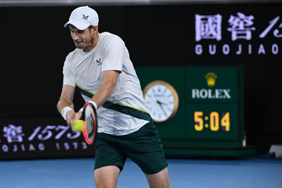 Britain's Andy Murray hits a shot against Australia's Thanasi Kokkinakis during their men's singles match on day four of the Australian Open tennis tournament in Melbourne on January 20, 2023. - -- IMAGE RESTRICTED TO EDITORIAL USE - STRICTLY NO COMMERCIAL USE -- (Photo by WILLIAM WEST / AFP) / -- IMAGE RESTRICTED TO EDITORIAL USE - STRICTLY NO COMMERCIAL USE -- (Photo by WILLIAM WEST/AFP via Getty Images)