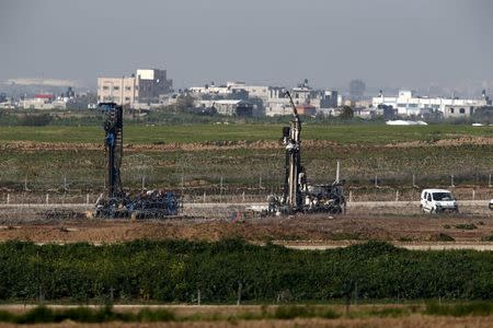 Drills can be seen at work on the line of the Israeli border with Gaza February 1, 2016. REUTERS/Amir Cohen