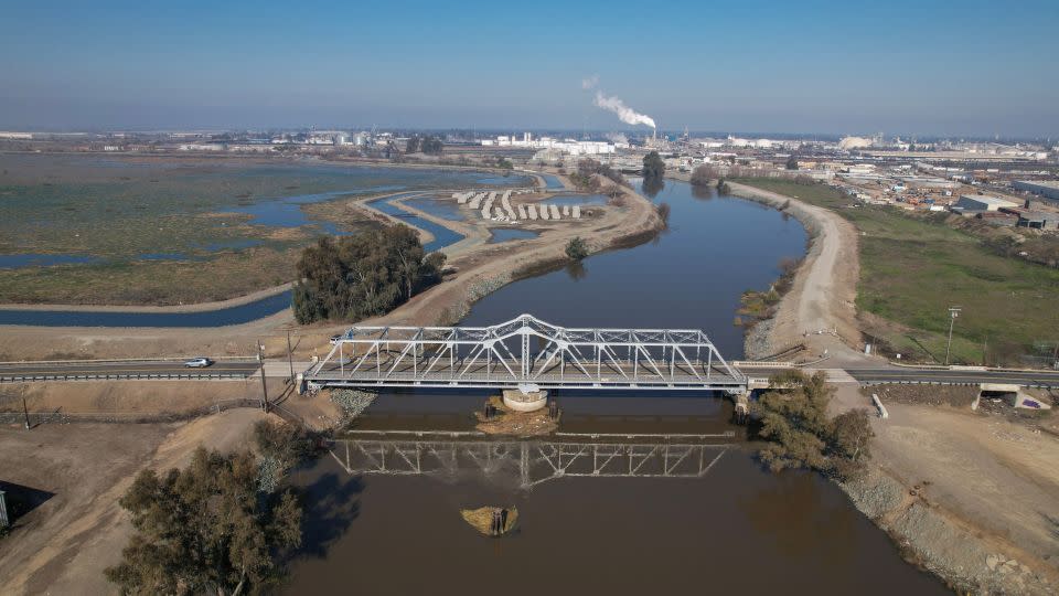 The San Joaquin River is seen cutting through residential, industrial, and agricultural lands in Stockton, California, U.S., January 26, 2023. - Nathan Frandino/Reuters