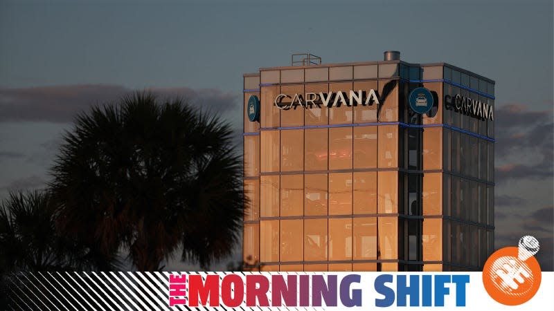 A photo of the Carvana glass tower of cars with The Morning Shift banner along the bottom. 