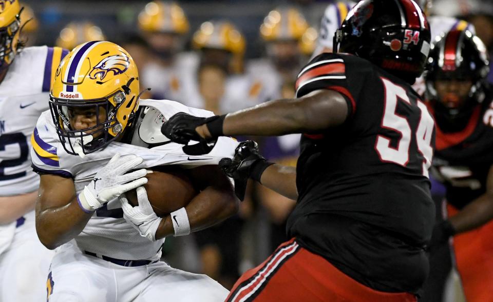 McKinley's Dior Garner (54) makes a tackle against Avon during a high school football game, Friday, Aug. 25, 2023.