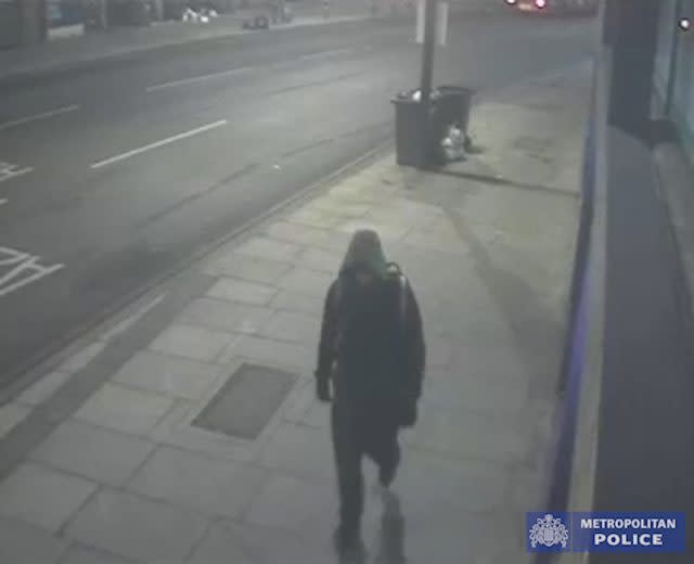 The man was wearing a hoody as he walked down Deptford Broadway carrying a large rucksack (Met Police/PA)