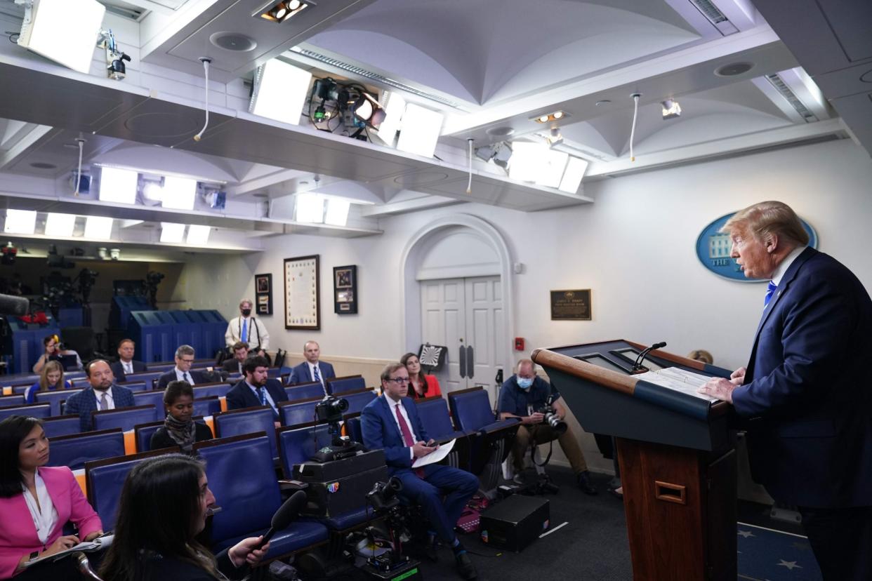 Donald Trump speaks to reporters at a White House briefing on the coronavirus pandemic: AFP/Getty